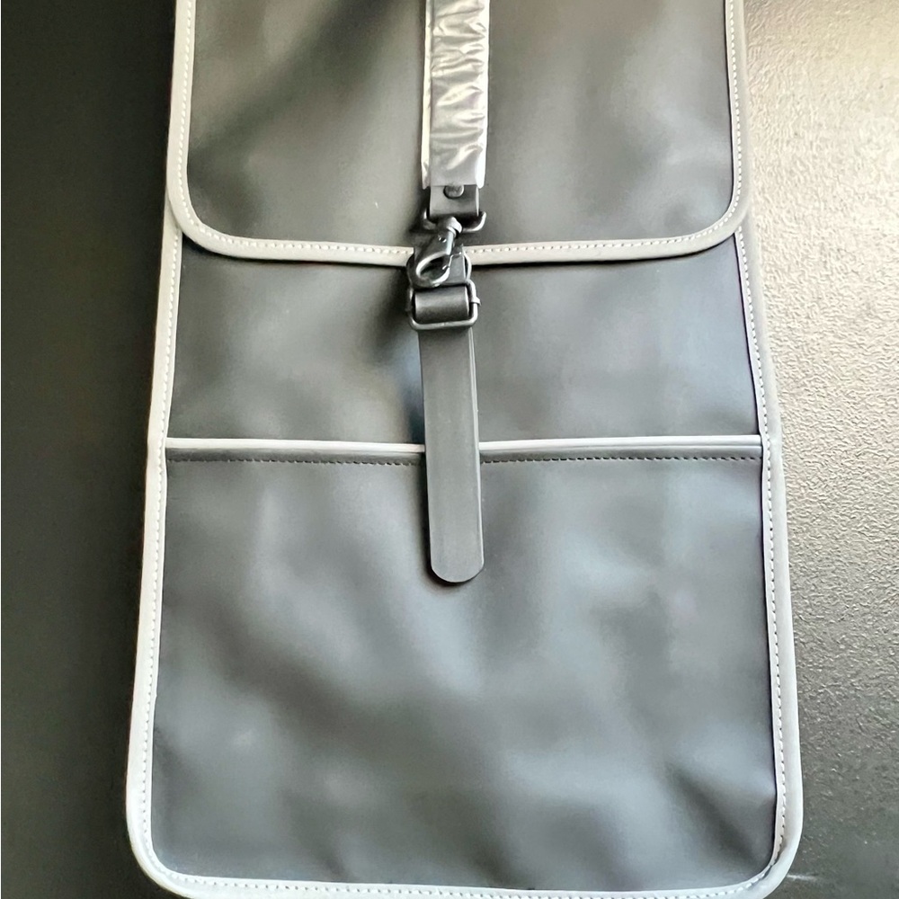 Rains Black reflective backpack
